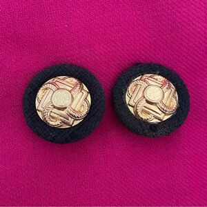 Vintage gold tone intricate disc on black fabric clip ons
